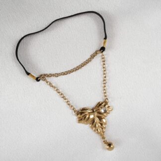 GIOIELLO PER TESTICOLI CON FOGLIA D'ORO